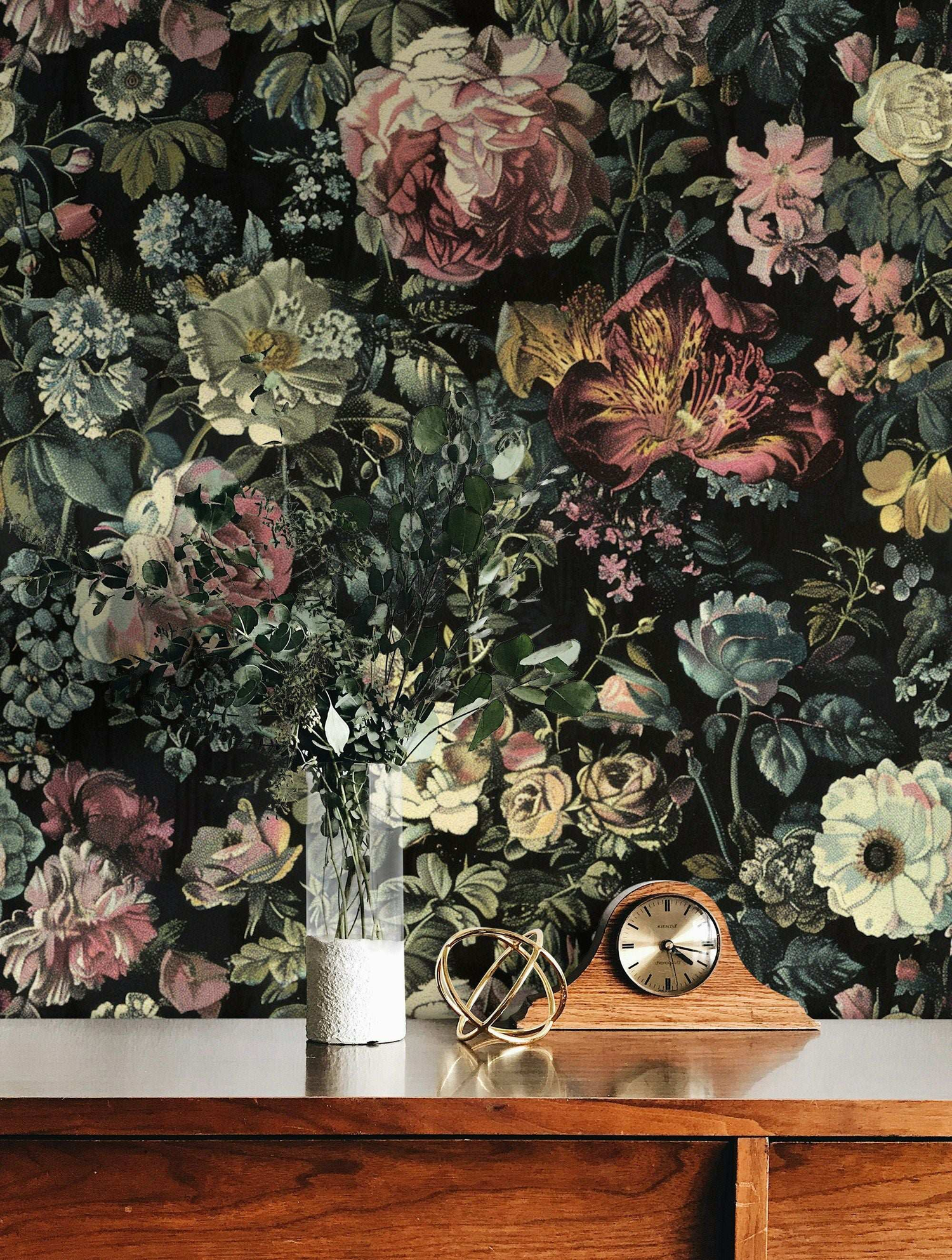 Vibrant floral wallpaper design with blooming roses and leafy vines in a modern living room interior